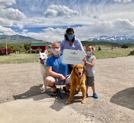 Family adopting dog at Second Chance Humane Society in Ridgway CO