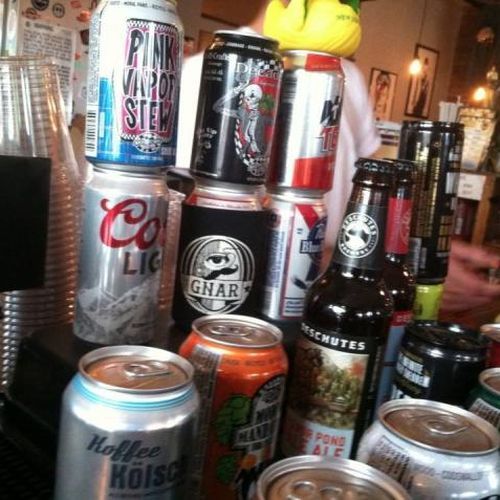 Image of several different types of craft beers in cans.