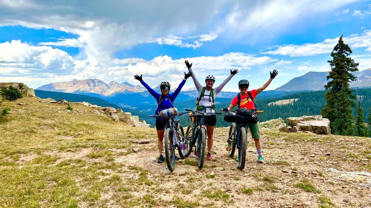 Bikers overlooking mountains in Colorado